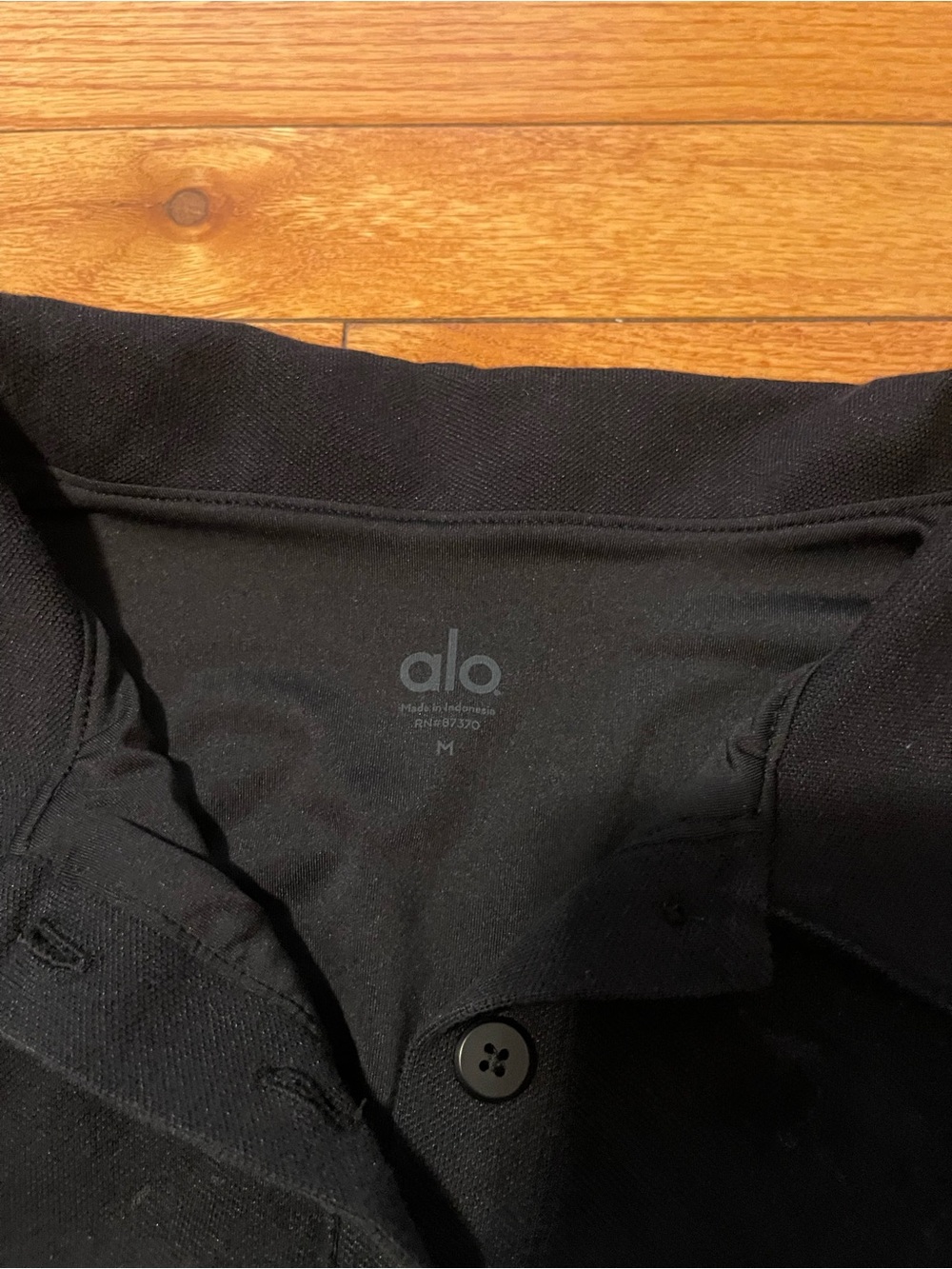 ALO Yoga Black Cropped Polo Tee - Picture 3 of 3